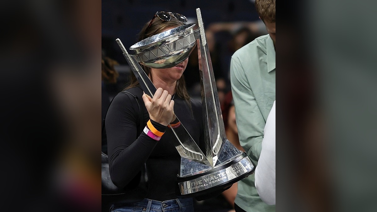 The PWHL Walter Cup championship trophy carried at an arena