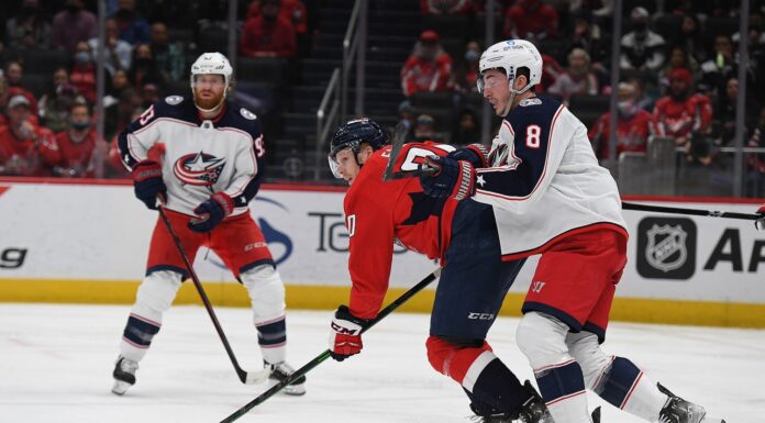 Werenski Extension: ‘Hopefully When I’m Eligible One Gets Done’ Zach Werenski of the Columbus Blue Jackets defends in front of the net at Capital One Arena