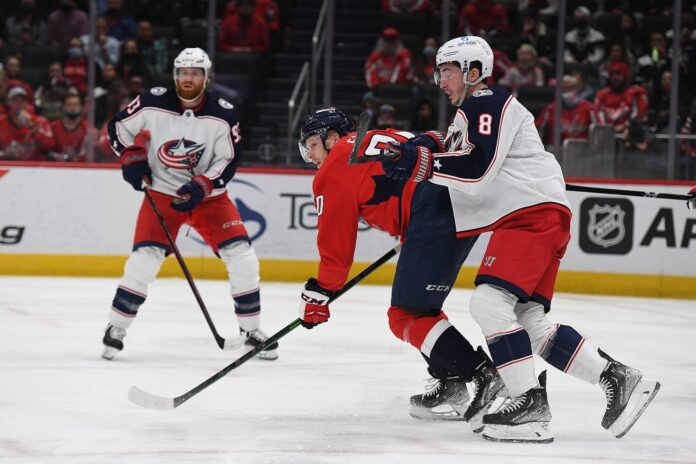 Zach Werenski Blue Jackets at Washington Zach Werenski of the Columbus Blue Jackets defends in front of the net at Capital One Arena