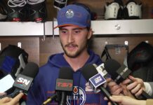 Formenton Preseason Debut: A Goal Inside, Protest Outside Alex Formenton speaks to reporters after his Edmonton Oilers preseason debut against the Winnipeg Jets