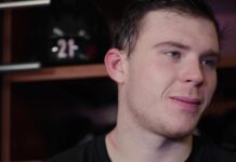 Brind’Amour Takes Shot at Nikishin Agents After Holdout Carolina Hurricanes defenseman Alexander Nikishin speaks to reporters in the locker room