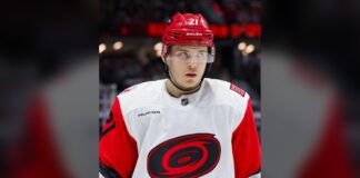 Nikishin Trade Request: Hurricanes Say He’ll Miss Camp Alexander Nikishin of the Carolina Hurricanes during a stoppage in play against the Ottawa Senators in the 2026 Stanley Cup Playoffs