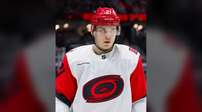 Nikishin Trade Request: Hurricanes Say He’ll Miss Camp Alexander Nikishin of the Carolina Hurricanes during a stoppage in play against the Ottawa Senators in the 2026 Stanley Cup Playoffs