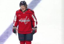 Andrew Cristall Fined: NHL Passes on Face Cross-Check Ban Washington Capitals forward Andrew Cristall skates off the ice after his ejection against the Philadelphia Flyers in Hershey