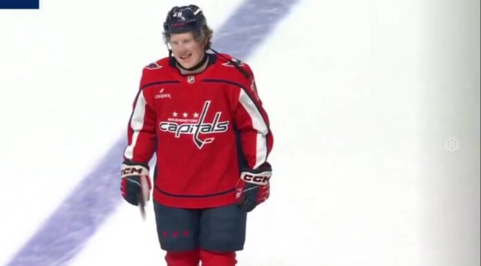 Andrew Cristall Fined: NHL Passes on Face Cross-Check Ban Washington Capitals forward Andrew Cristall skates off the ice after his ejection against the Philadelphia Flyers in Hershey