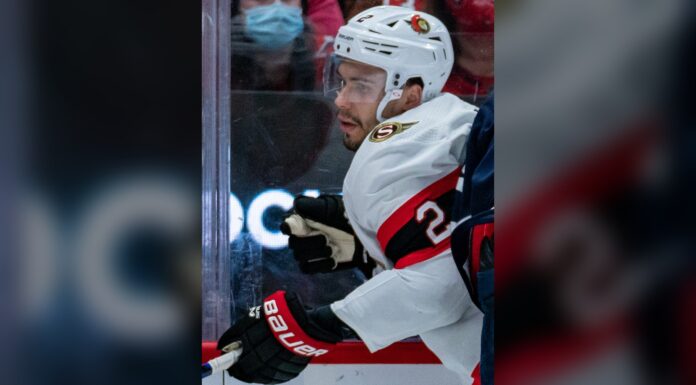 Artem Zub Injury: Senators D Likely Out for Opener Artem Zub of the Ottawa Senators battles along the boards in a white road jersey