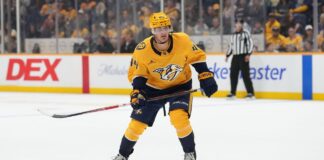 Brady Martin: Predators Assign Top Prospect to AHL Brady Martin skates in Nashville Predators gold jersey during NHL action