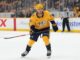 Brady Martin: Predators Assign Top Prospect to AHL Brady Martin skates in Nashville Predators gold jersey during NHL action