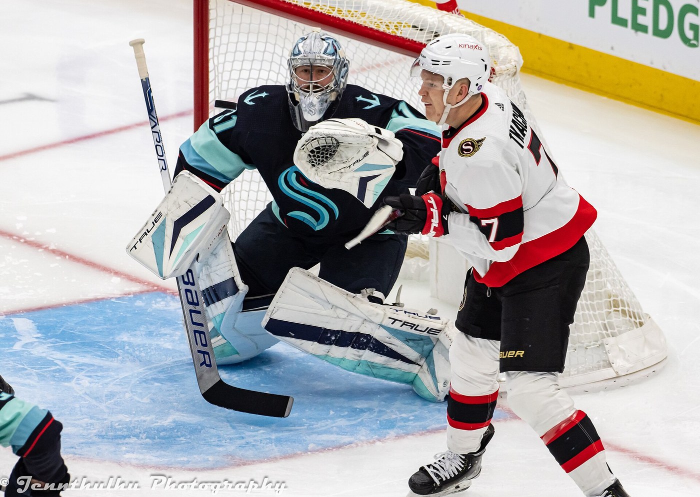 Brady Tkachuk screens Seattle goaltender Philipp Grubauer during an Ottawa Senators game