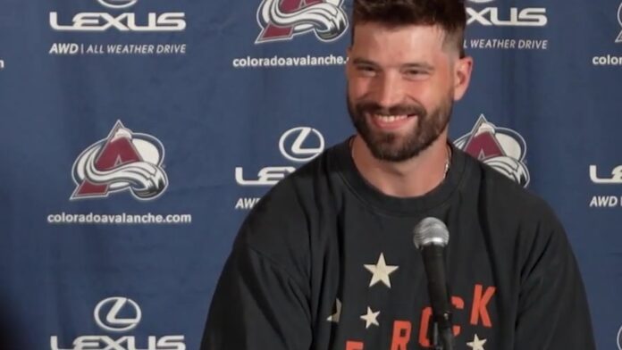 Brent Burns new look Avalanche media day 2026 Colorado Avalanche defenseman Brent Burns with a trimmed beard, new haircut and new front teeth at 2026 training camp media day