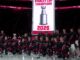 Hurricanes Raise Stanley Cup Banner Before Panthers Opener Carolina Hurricanes pose for a team photo under their 2026 Stanley Cup champions banner at Lenovo Center before the season opener against the Florida Panthers