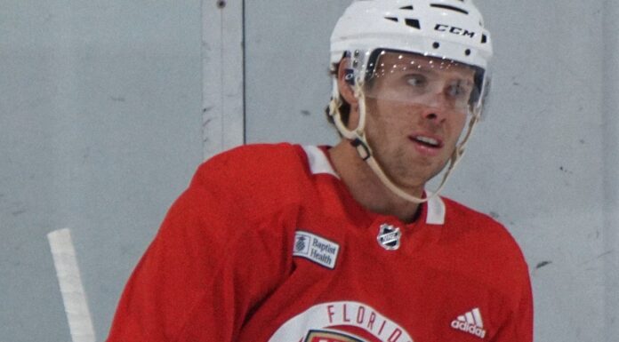 Panthers Hat Trick Streak: 3 Straight Natural Hat Tricks Carter Verhaeghe in a red Florida Panthers practice jersey