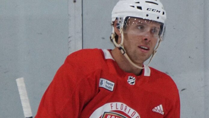 Carter Verhaeghe at Florida Panthers practice Carter Verhaeghe in a red Florida Panthers practice jersey