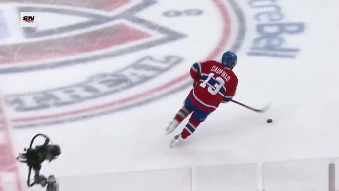 Cole Caufield carries the puck at Bell Centre Cole Caufield carries the puck through center ice at Bell Centre during the Canadiens preseason opener against the Maple Leafs