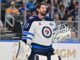 Hellebuyck Trade: Dreger Doubts He Reports to Jets Camp Winnipeg Jets goaltender Connor Hellebuyck during a timeout against the St. Louis Blues