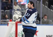 NHL Trade Requests: Daly Says No Fix Until the 2030 CBA Winnipeg Jets goaltender Connor Hellebuyck leans on the net during a timeout against the New York Islanders
