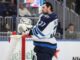 NHL Trade Requests: Daly Says No Fix Until the 2030 CBA Winnipeg Jets goaltender Connor Hellebuyck leans on the net during a timeout against the New York Islanders