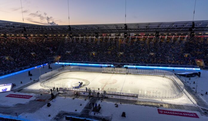 DEL Winter Game 2026 Dresden A packed Rudolf-Harbig-Stadion in Dresden hosts the DEL Winter Game 2026 between the Dresdner Eisloewen and Eisbaeren Berlin