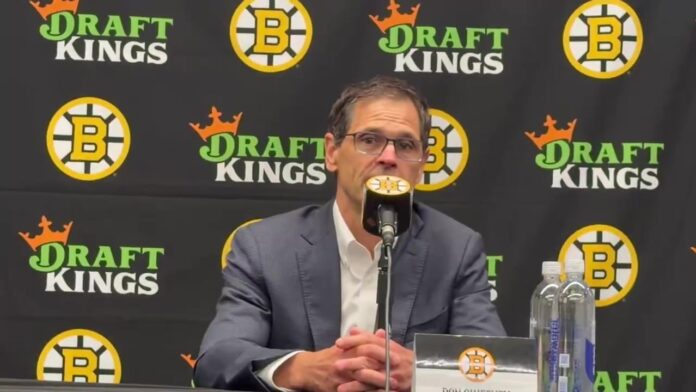 Don Sweeney Bruins captain announcement 2026 Bruins GM Don Sweeney speaks at the podium on the opening day of training camp, saying Boston will name a captain before opening night