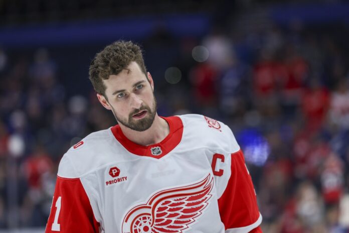 Dylan Larkin Red Wings trade request Ilitch September 2026 Detroit Red Wings center Dylan Larkin warms up before a game against the Tampa Bay Lightning