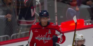 Jordan Kyrou Scores First Capitals Goal in OT Win Dylan Strome celebrates a goal for the Washington Capitals in a red home jersey against the Boston Bruins