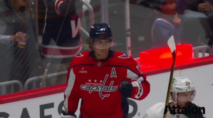 Jordan Kyrou Scores First Capitals Goal in OT Win Dylan Strome celebrates a goal for the Washington Capitals in a red home jersey against the Boston Bruins