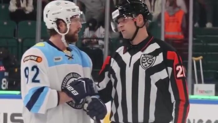 Evgeny Kuznetsov talks with a KHL referee during Sibir Novosibirsk debut Evgeny Kuznetsov of Sibir Novosibirsk speaks with a KHL referee during his debut against Ak Bars