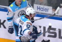 Evgeny Kuznetsov celebrates his 100th career KHL goal in his Sibir Novosibirsk debut