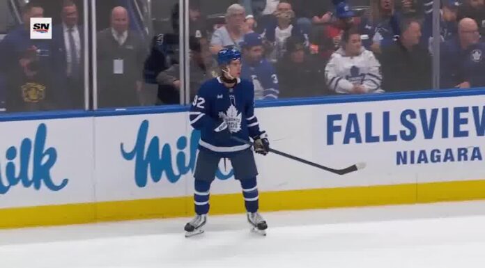 Gavin McKenna Notches First NHL Point in Leafs Win Gavin McKenna Toronto Maple Leafs jersey number 92 skating vs Ottawa Senators preseason