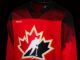 Hockey Canada Jersey Unveiled: The Crest Is Back Up Front Hockey Canada new 2026-27 Bauer jersey with the gold-bordered skater crest returning to the front