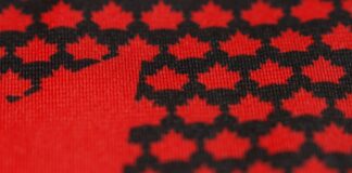 Hockey Canada Jersey Reveal Set for Sept. 9 After Teaser Hockey Canada new jersey teaser showing black maple leaves on a red base ahead of the 2027 World Juniors
