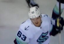 Jacob Melanson Signing: Kraken Keep Their Hits Leader Jacob Melanson celebrates his first NHL goal for the Seattle Kraken against the Calgary Flames