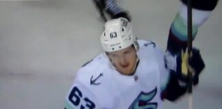 Jacob Melanson Signing: Kraken Keep Their Hits Leader Jacob Melanson celebrates his first NHL goal for the Seattle Kraken against the Calgary Flames