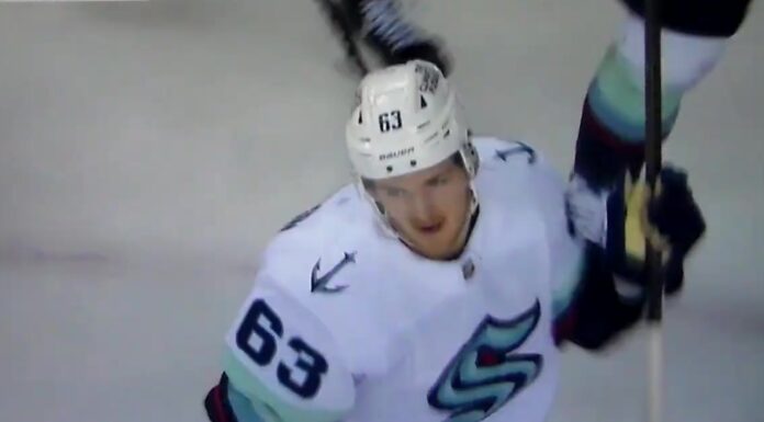 Jacob Melanson Signing: Kraken Keep Their Hits Leader Jacob Melanson celebrates his first NHL goal for the Seattle Kraken against the Calgary Flames