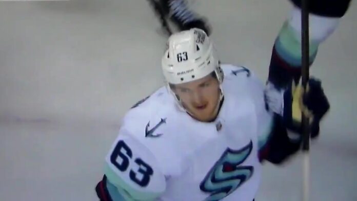Jacob Melanson Kraken first NHL goal celebration Jacob Melanson celebrates his first NHL goal for the Seattle Kraken against the Calgary Flames