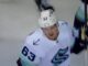 Jacob Melanson Signing: Kraken Keep Their Hits Leader Jacob Melanson celebrates his first NHL goal for the Seattle Kraken against the Calgary Flames