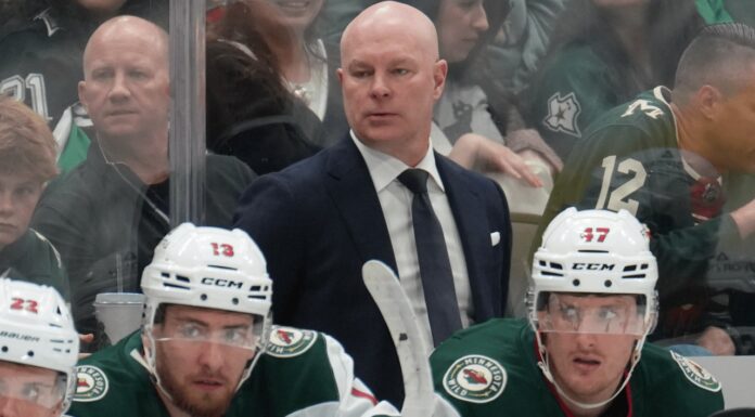 John Hynes Extension: Wild Sign Coach to Multi-Year Deal Minnesota Wild head coach John Hynes watches from behind the bench