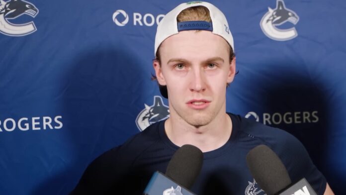 Jonathan Lekkerimaki Canucks contract year 2026-27 Jonathan Lekkerimaki speaks to media after a Vancouver Canucks game during the 2025-26 season