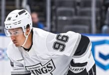 Andrei Kuzmenko’s Father Killed in Bear Attack in Russia Andrei Kuzmenko waits for a face-off during an NHL game