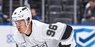 Andrei Kuzmenko’s Father Killed in Bear Attack in Russia Andrei Kuzmenko waits for a face-off during an NHL game