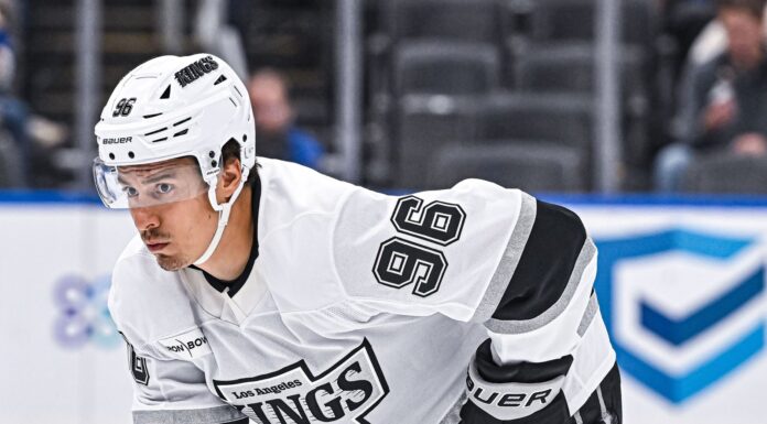Andrei Kuzmenko’s Father Killed in Bear Attack in Russia Andrei Kuzmenko waits for a face-off during an NHL game