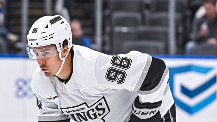 kuzmenko-featured Andrei Kuzmenko waits for a face-off during an NHL game