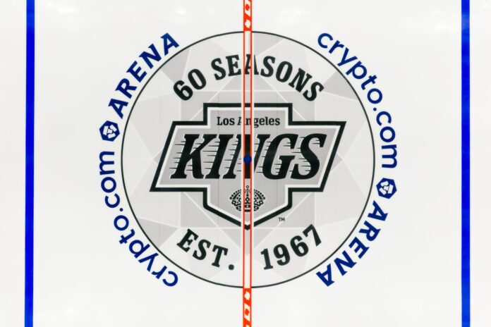 LA Kings 60th anniversary center ice logo Crypto.com Arena Los Angeles Kings 60th anniversary logo painted at center ice at Crypto.com Arena