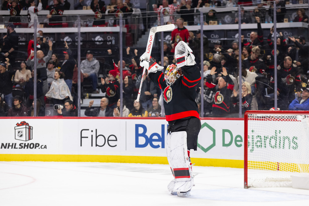 Ottawa Senators goalie Linus Ullmark celebrates an overtime win