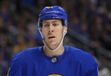 Logan Stanley Signing: Islanders Add D-Man on 1-Year Deal Logan Stanley in Buffalo Sabres jersey warming up before a game