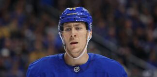 Logan Stanley Signing: Islanders Add D-Man on 1-Year Deal Logan Stanley in Buffalo Sabres jersey warming up before a game