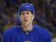 Logan Stanley Signing: Islanders Add D-Man on 1-Year Deal Logan Stanley in Buffalo Sabres jersey warming up before a game