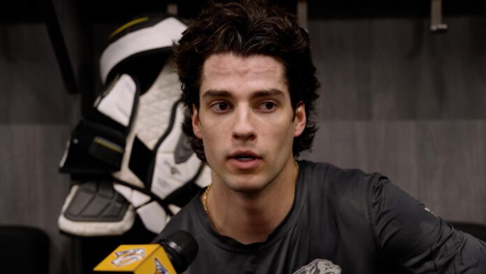 Luke Evangelista trade Devils Predators 2026 Luke Evangelista speaks to media before a Nashville Predators game before his trade to the New Jersey Devils