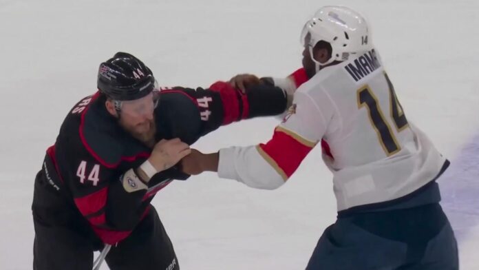 Nic Deslauriers Boko Imama fight Hurricanes Panthers Hurricanes forward Nic Deslauriers fights Panthers forward Boko Imama in the first fight of the 2026-27 NHL season
