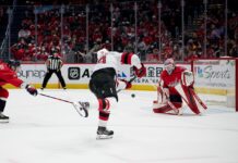 Hischier Extension: Why He Passed on 2027 Free Agency Nico Hischier of the New Jersey Devils shoots the puck past Capitals goalie Ilya Samsonov